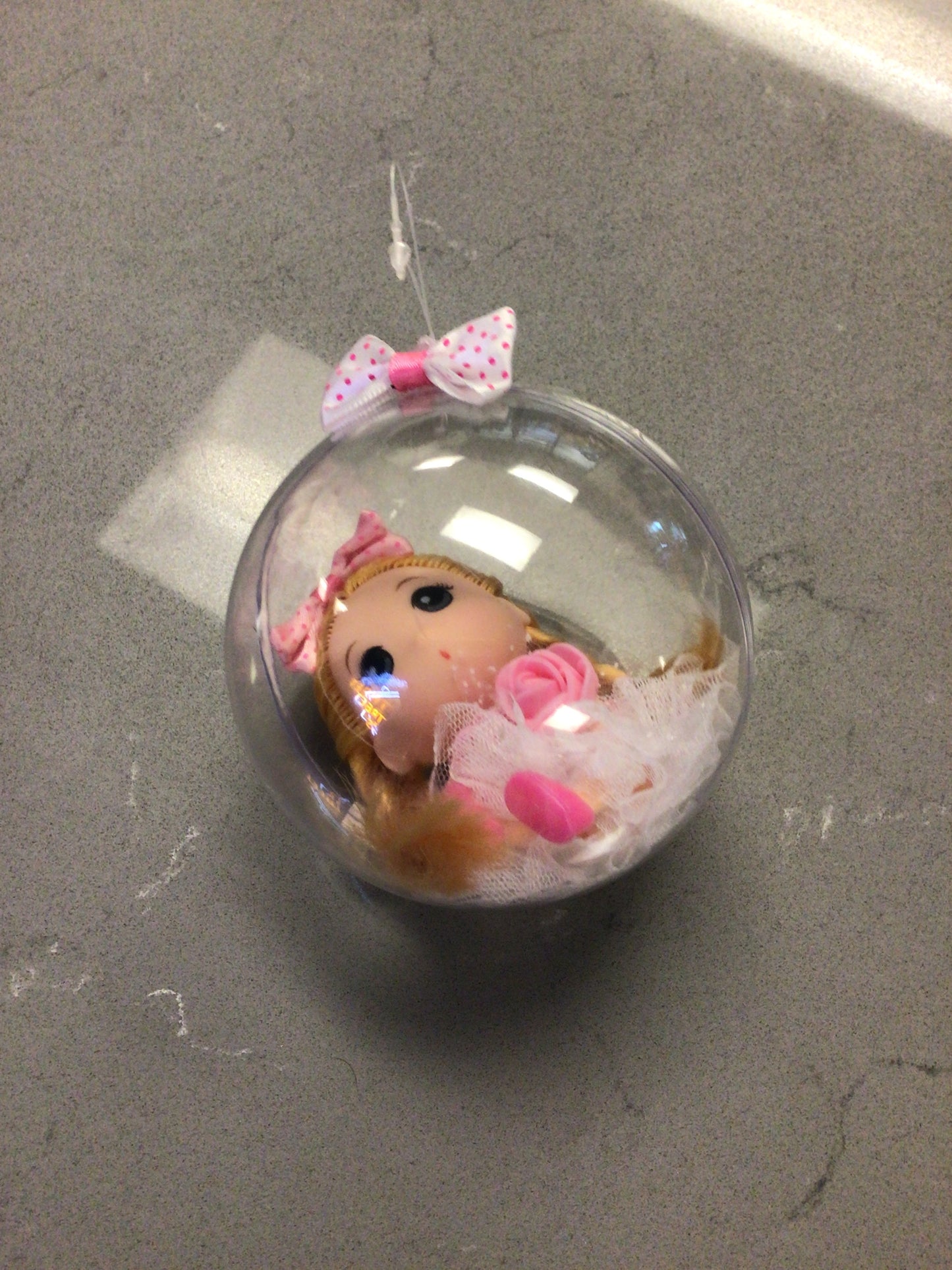 Doll in Capsule