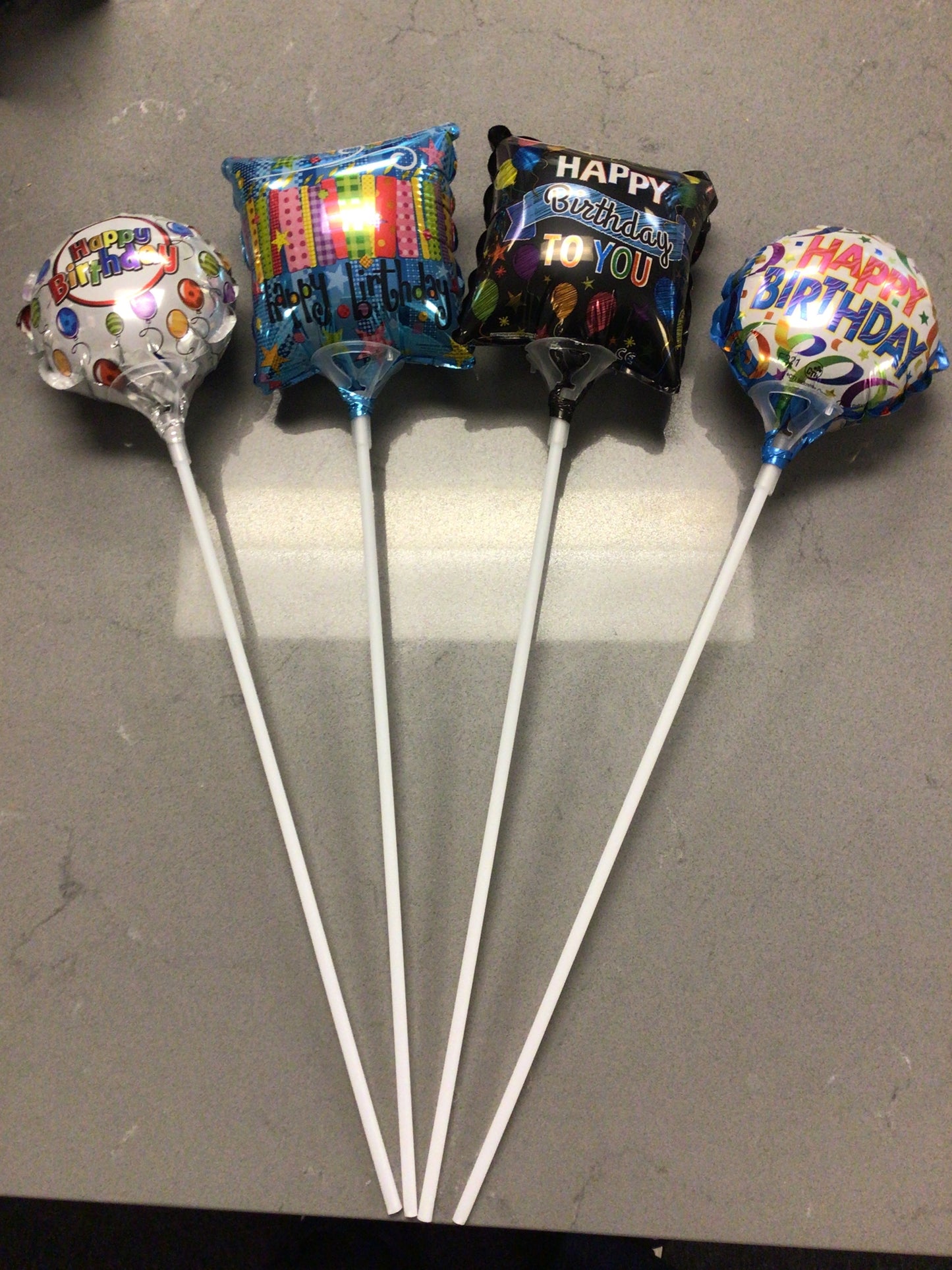 4” filled balloon w/Stick