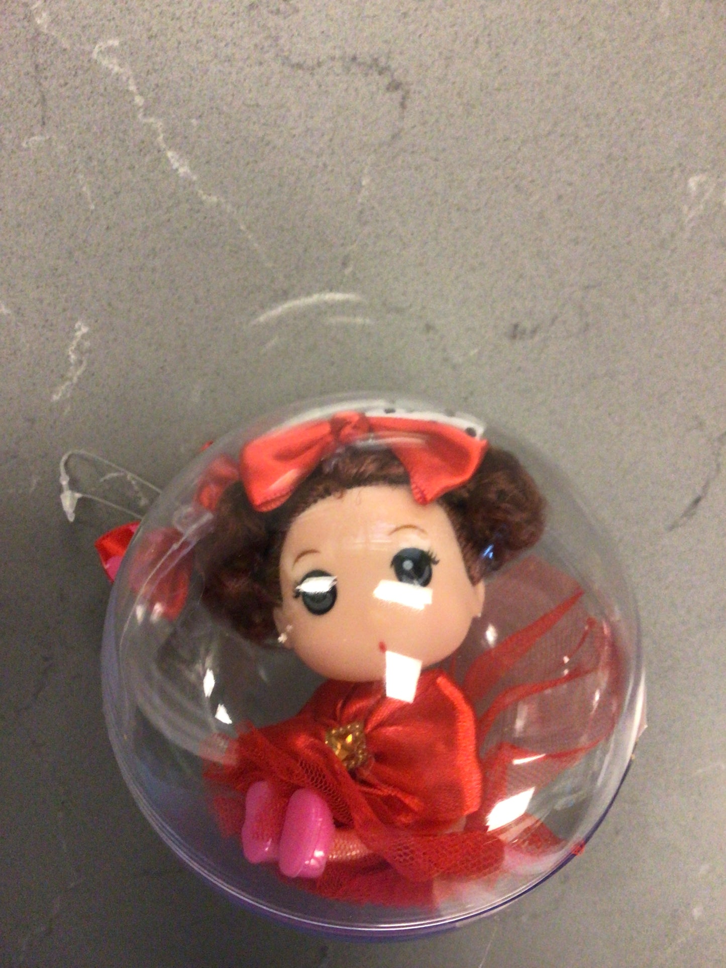Doll in Capsule